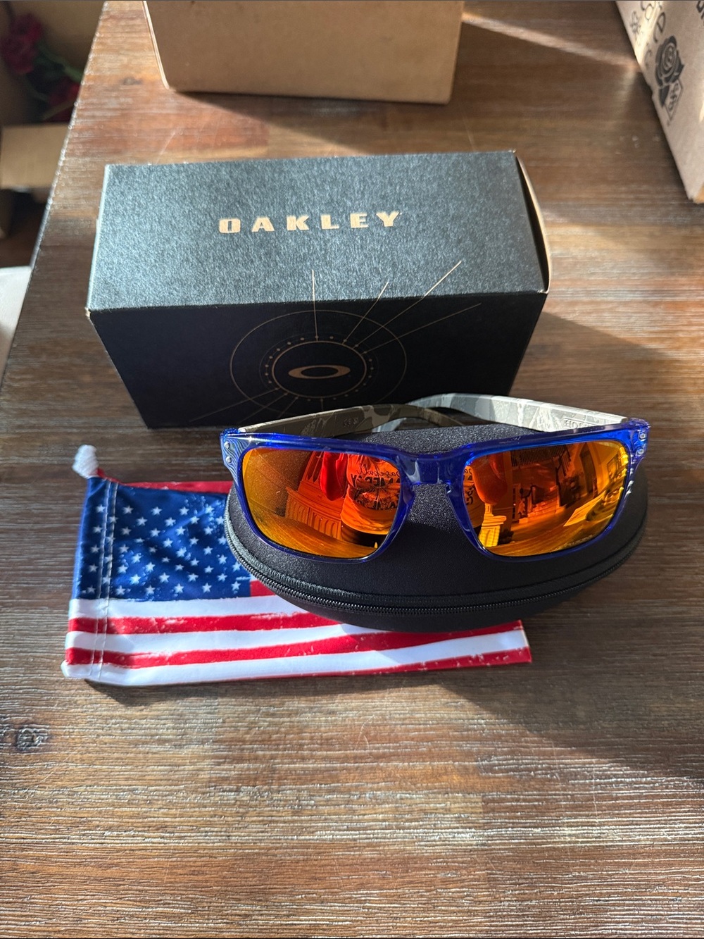 Oakley Men's Sunglasses - Blue Frame with Orange Mirror Lenses